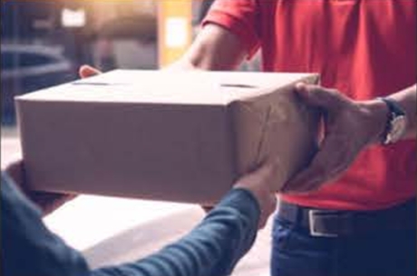 Courier completing a same-day delivery handoff in the Bronx